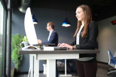 Standing desks are a common ergonomic workplace modification that may be made to help improve posture and efficiency at work.